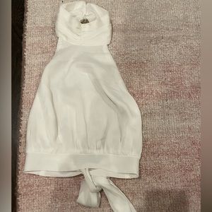 Size 2, open back, high neck, ties in the back